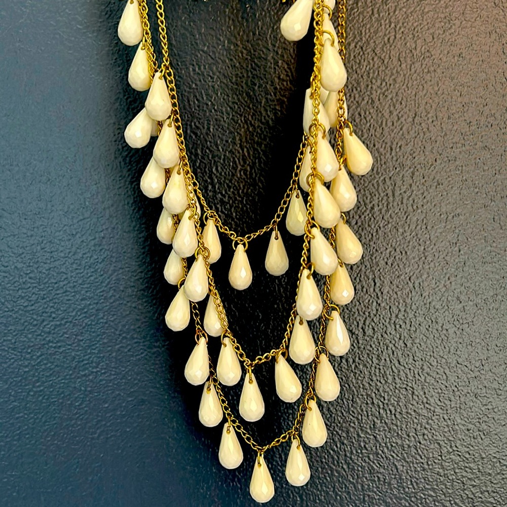 White drop 3 strand necklace by Akira